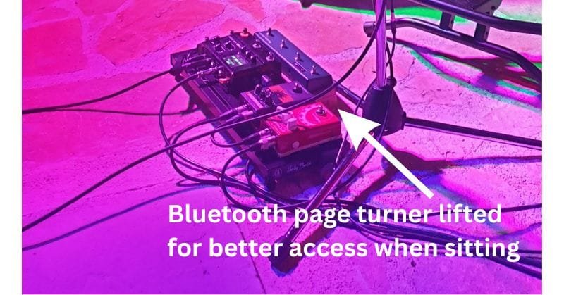 Bluetooth page turner lifted for better access when sitting Bluetooth page turner lifted for better access when sitting
